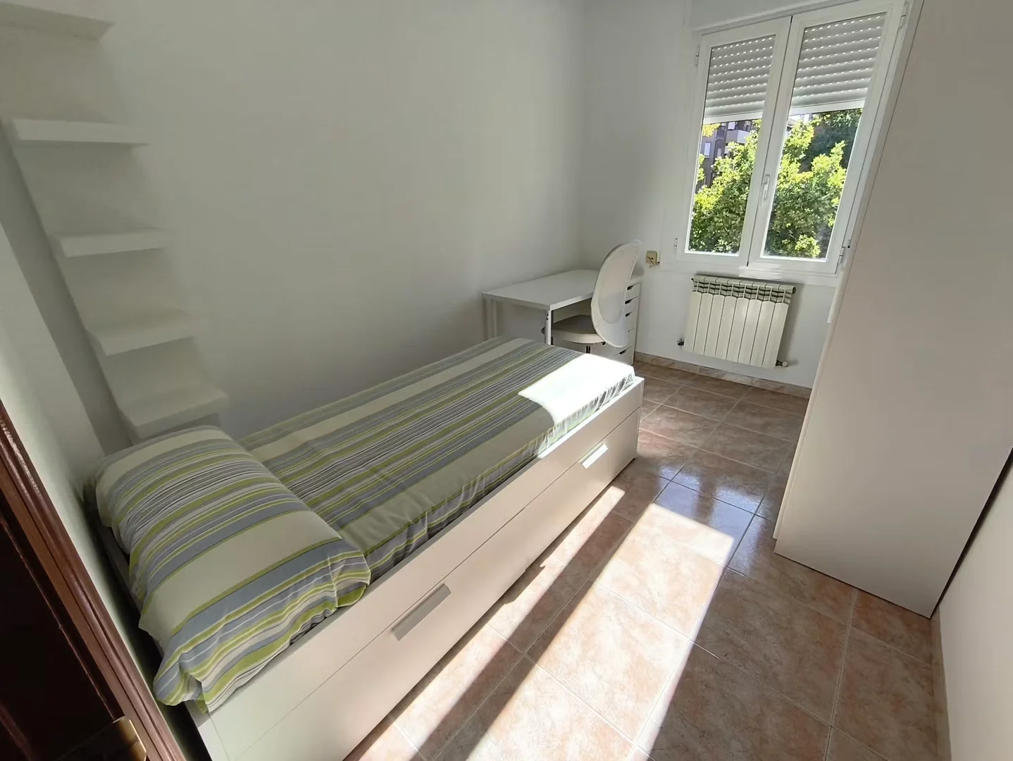 Student room in  with study area and shared facilities