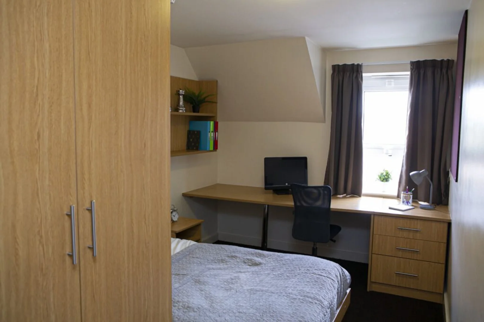 Quarto amigo do estudante em  com comodidades modernas