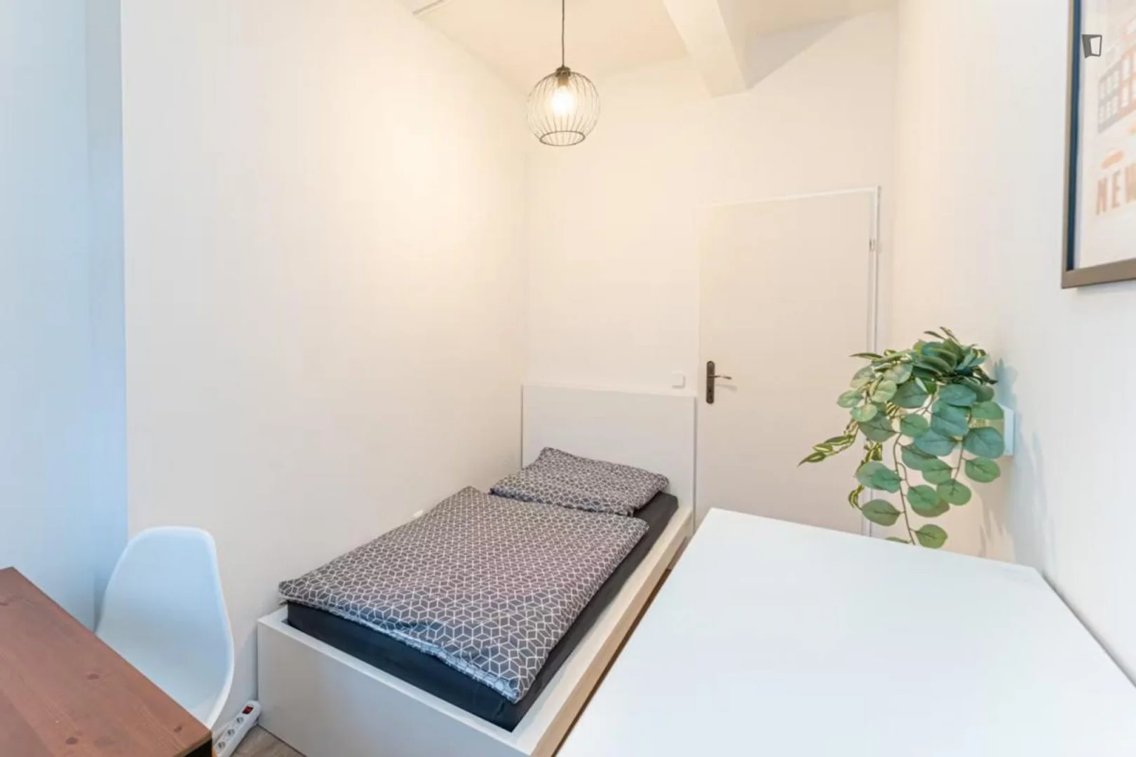 Student room in  with study area and shared facilities
