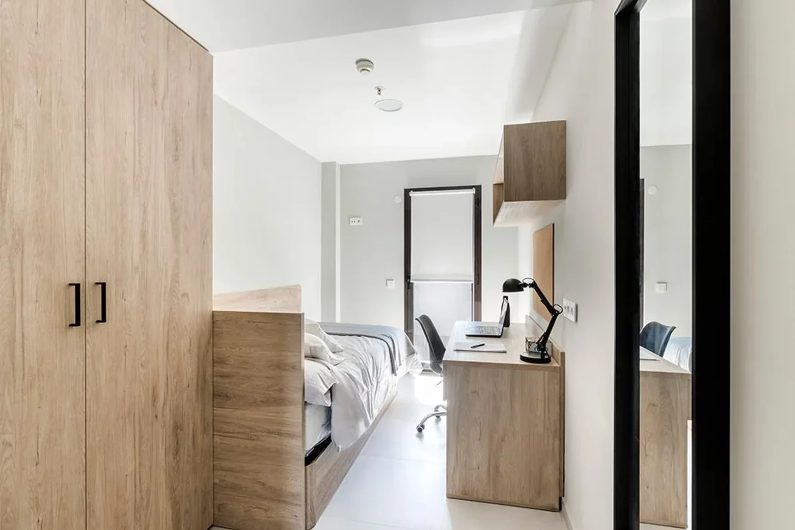 Student room in  with study area and shared facilities