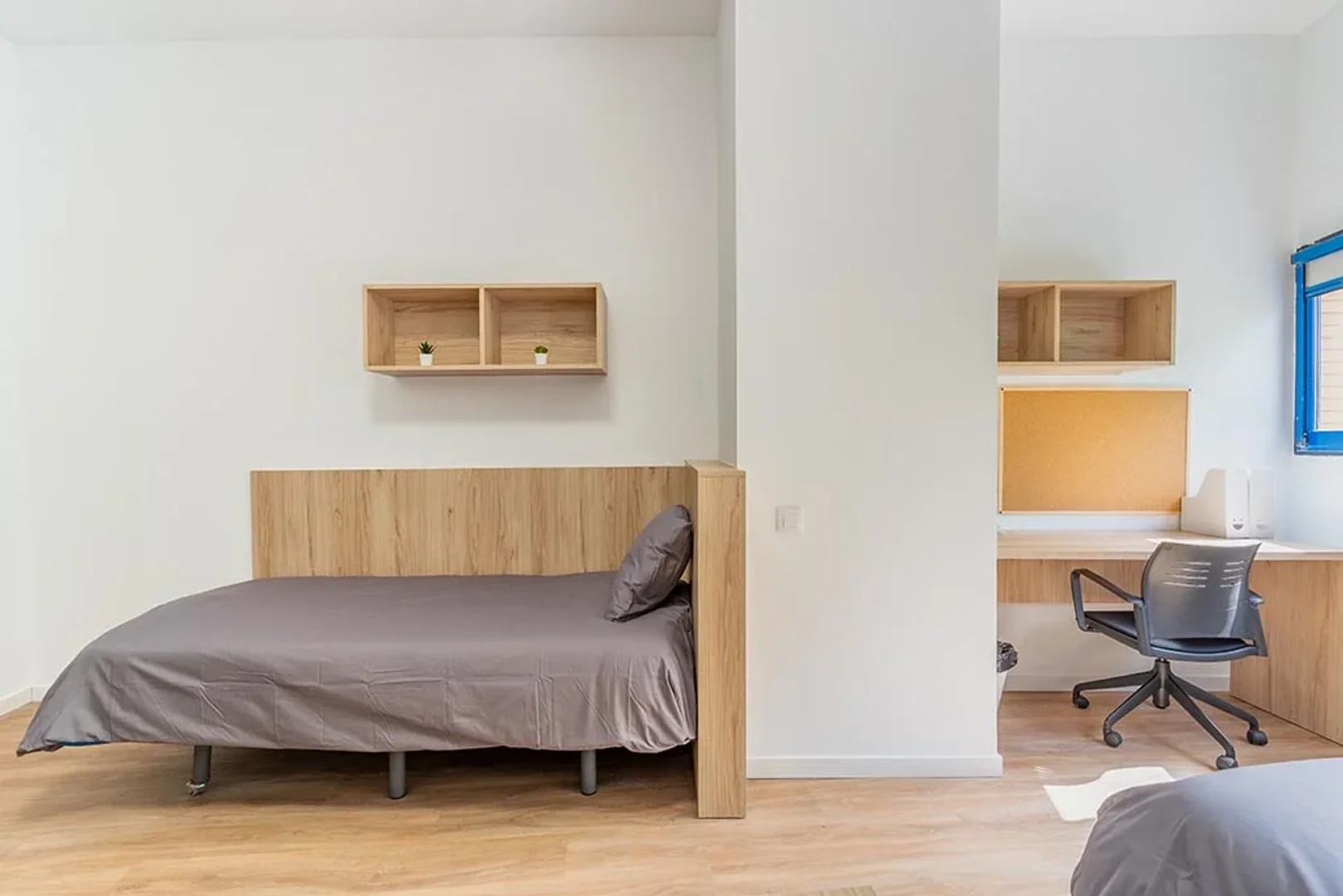 Student room in  with study area and shared facilities