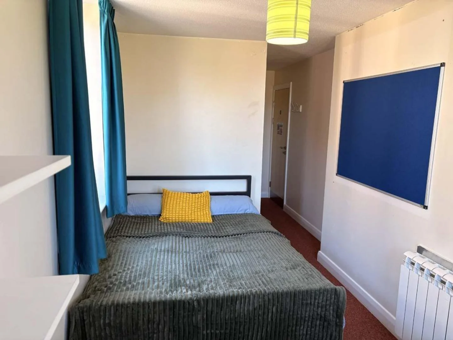 Student room in  with study area and shared facilities