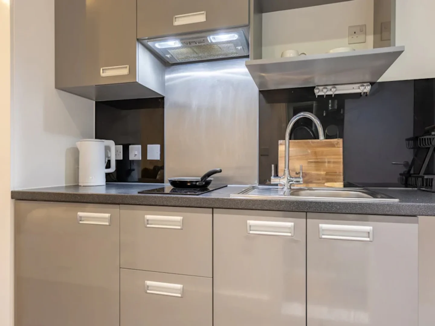 Affordable studio apartment with essential features in