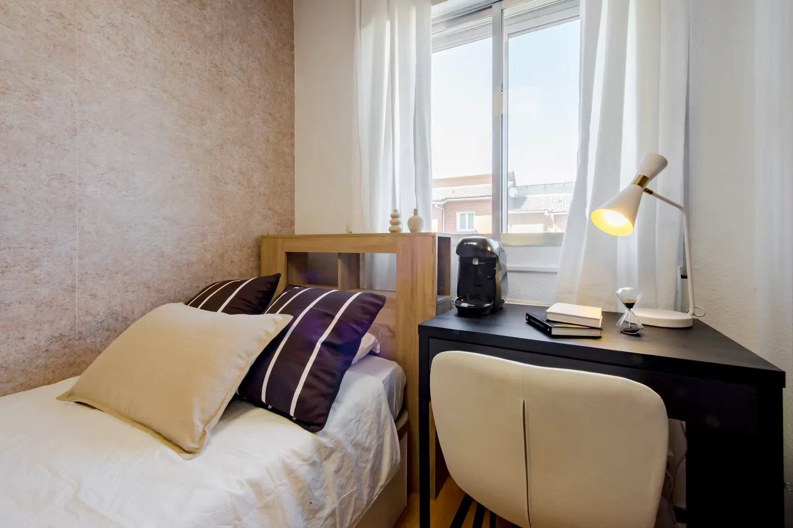 Affordable room for students with ample lighting in 
