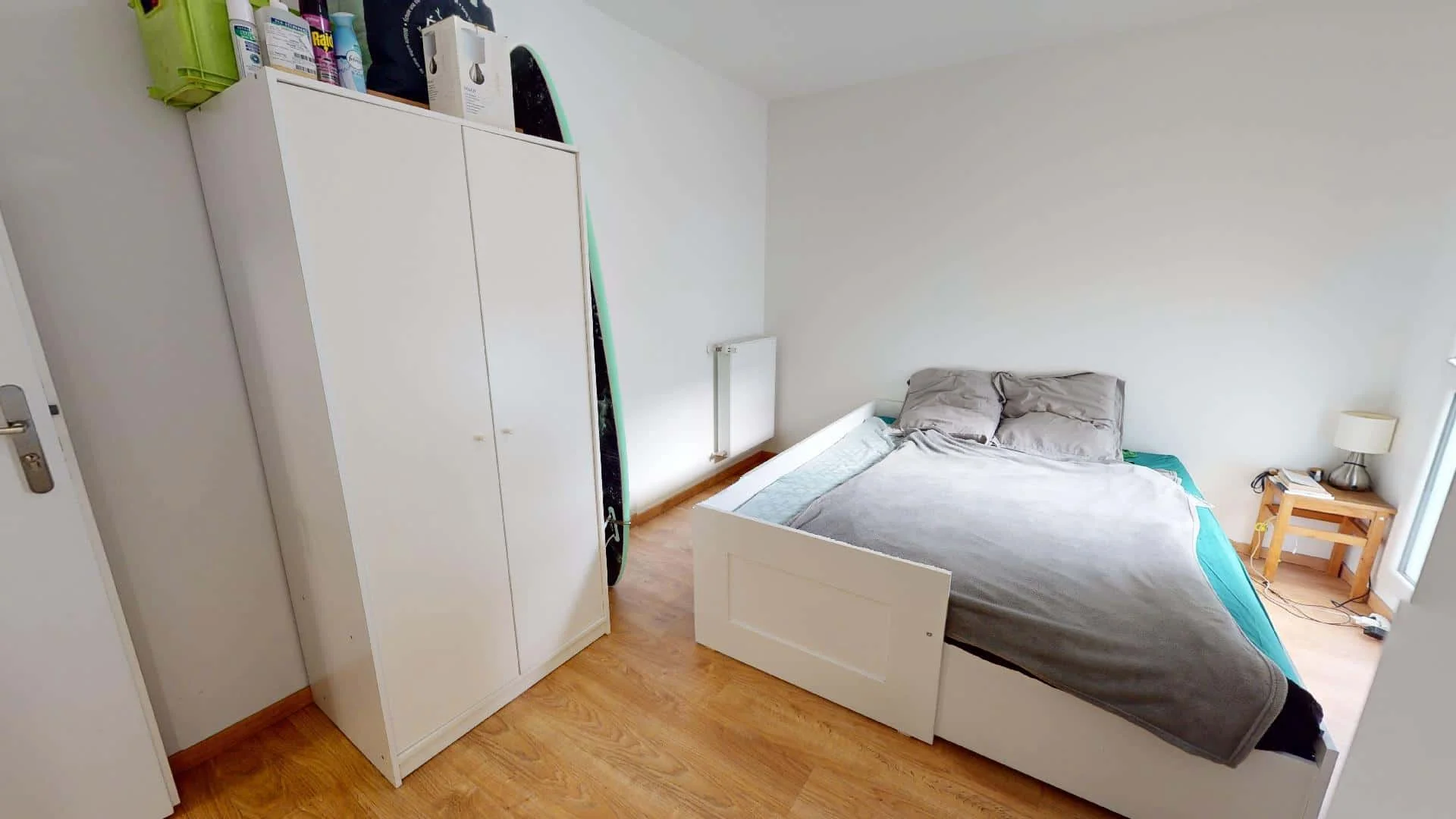 Student room in with study area and shared facilities