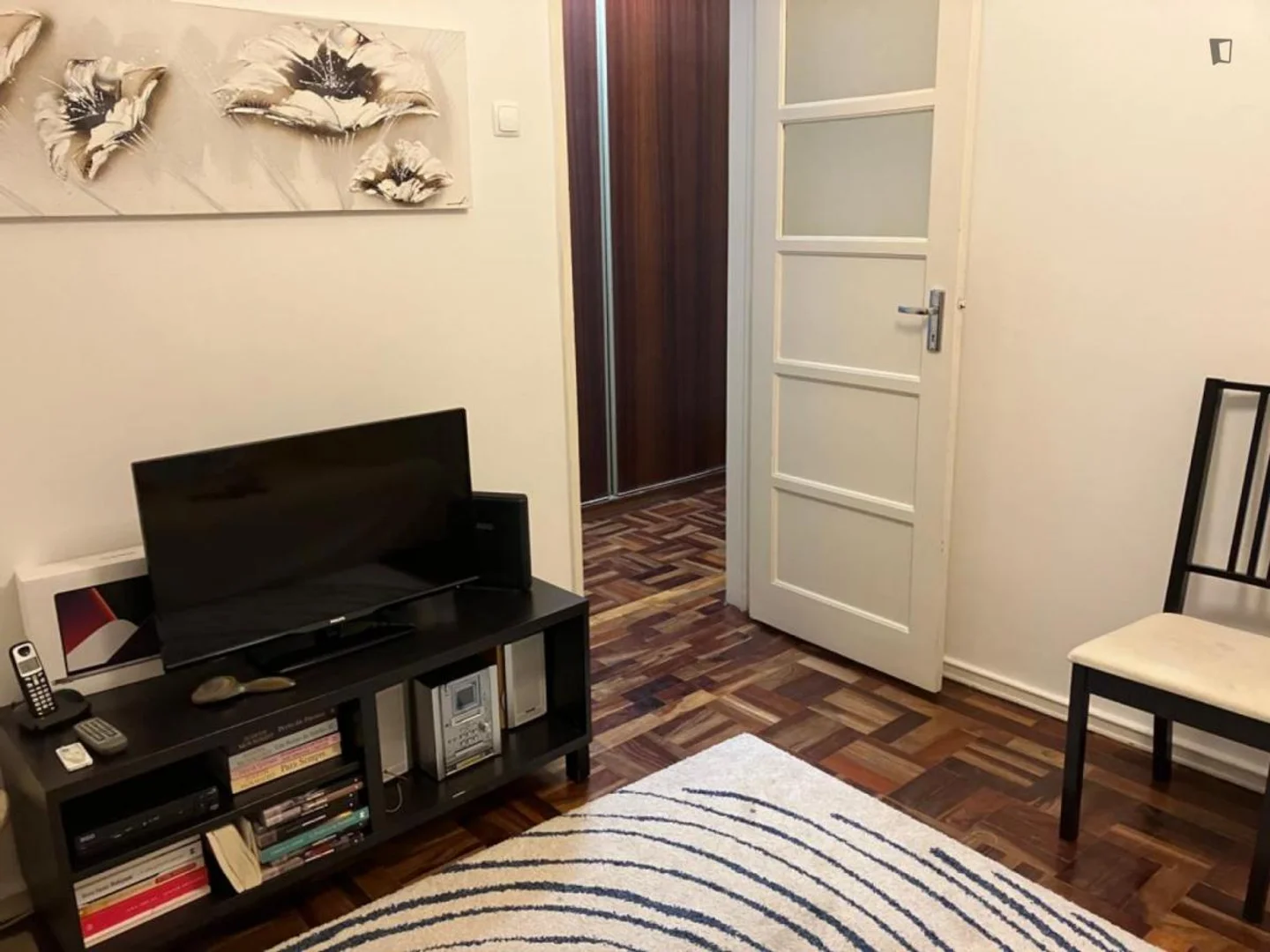 Student room in with study area and shared facilities