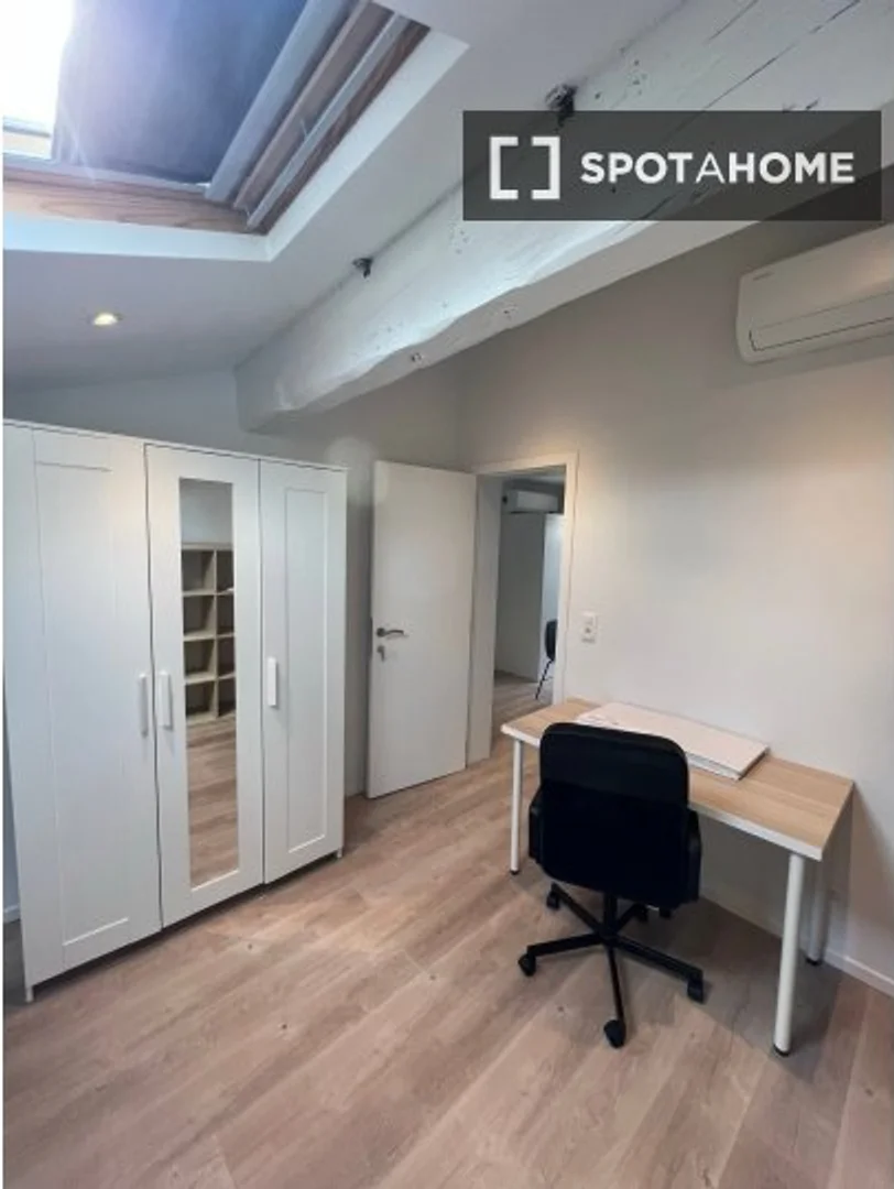 Student room in  with study area and shared facilities