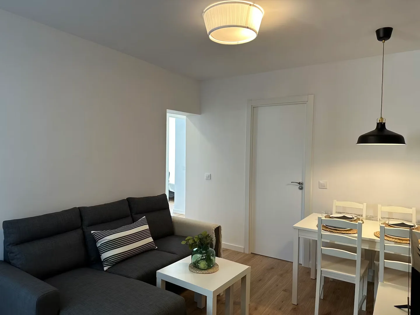 Student room in with study area and shared facilities