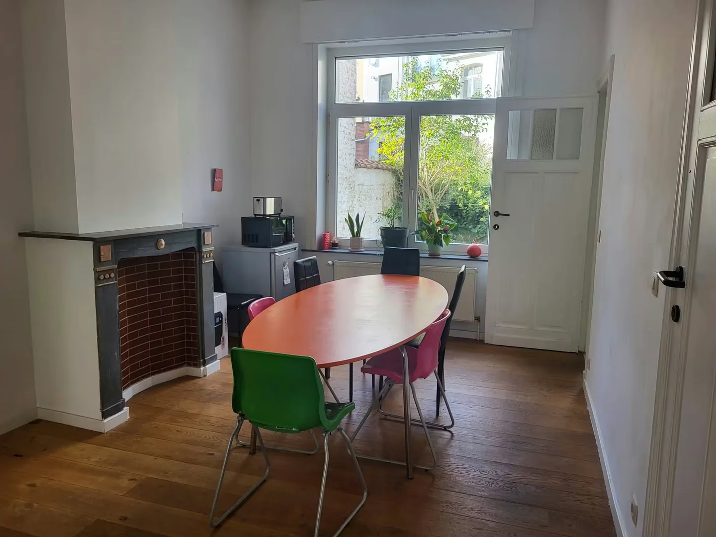 Student room in with study area and shared facilities