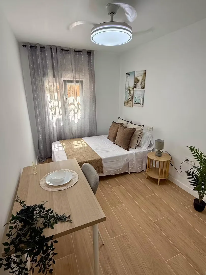 Student room in  with study area and shared facilities