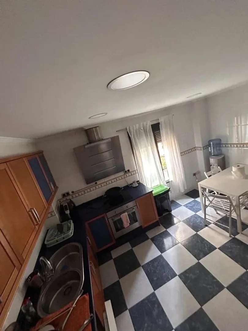 Affordable room for students with ample lighting in 