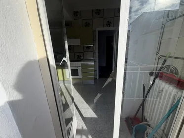 Shared room at Calle Marqués de la Ensenada, 38, esc. 0 7º 3. 1, image 12 of 16