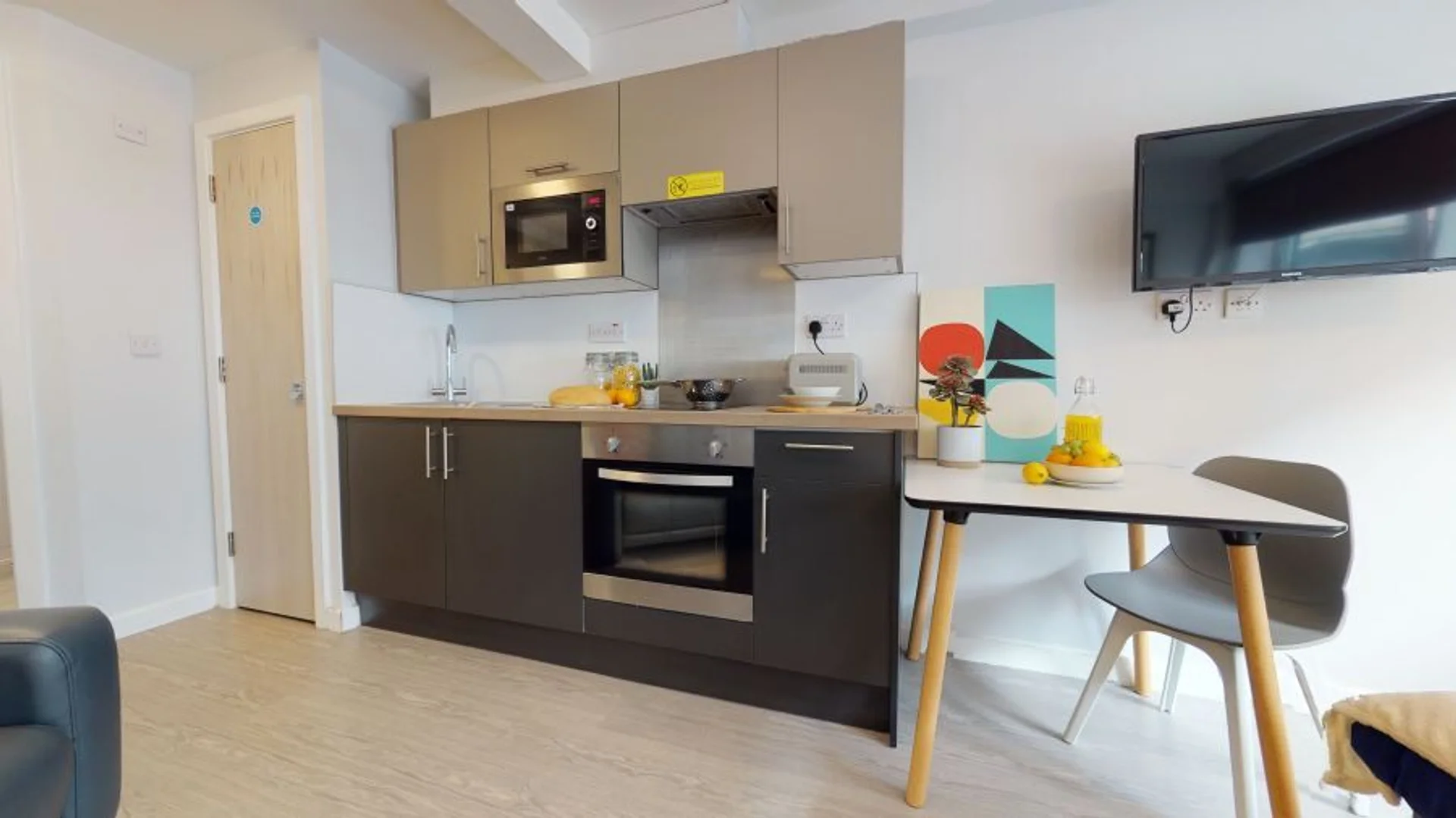 Affordable studio apartment with essential features in