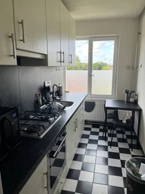 {area} de çift kişilik yataklı kiralık oda