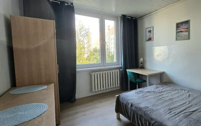 {area} de çift kişilik yataklı kiralık oda