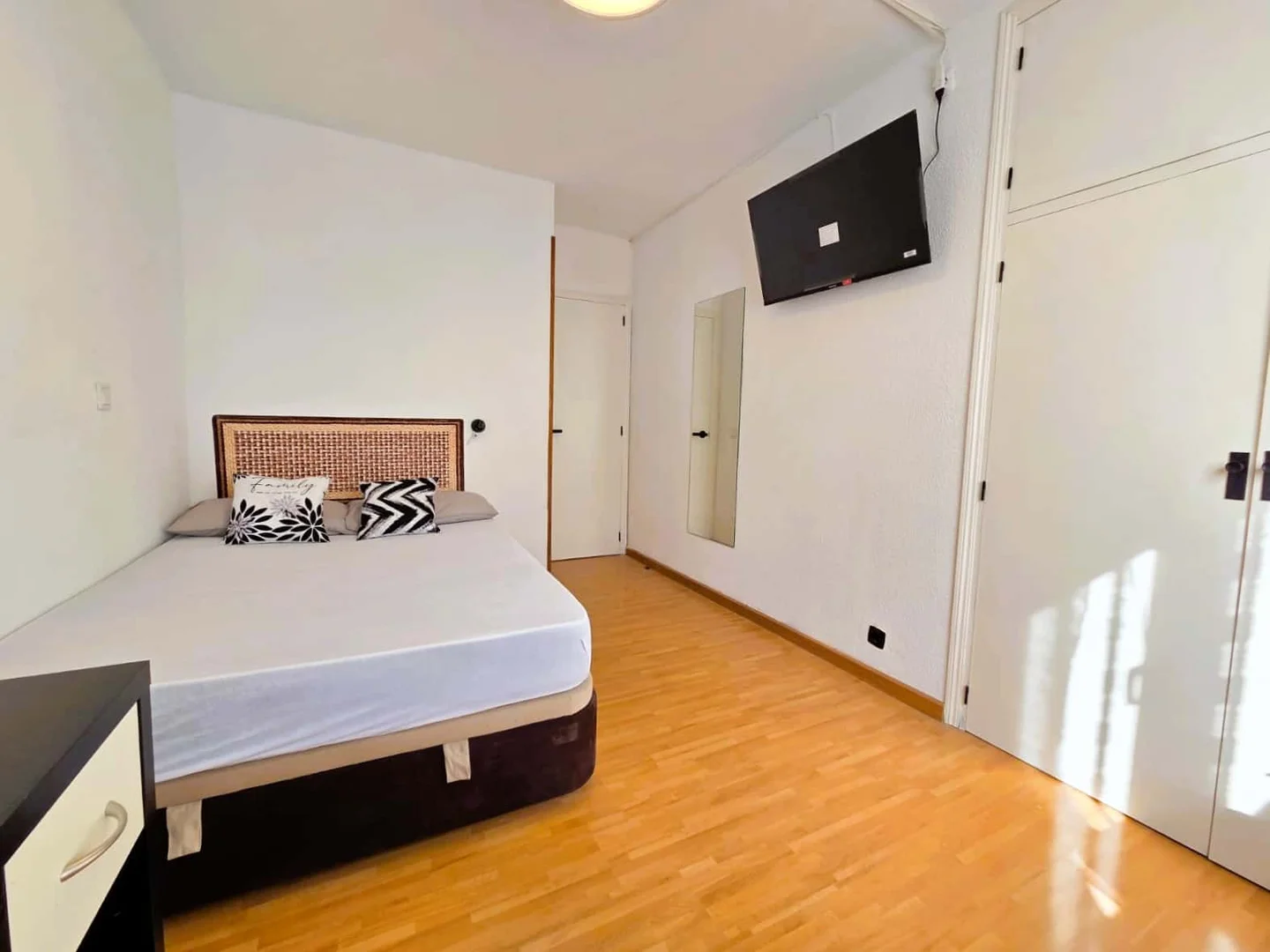 Student room in with study area and shared facilities