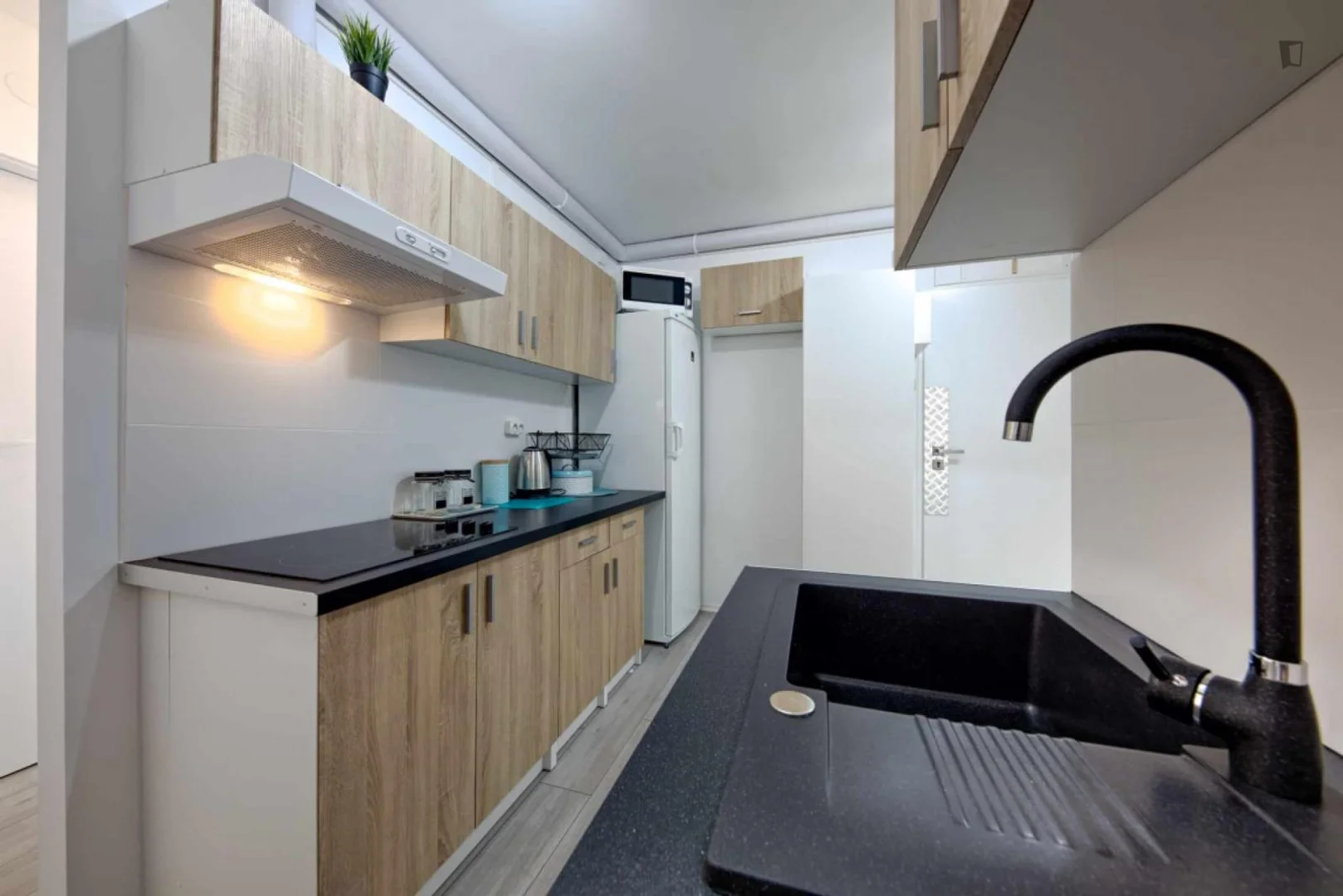 Student room in  with study area and shared facilities