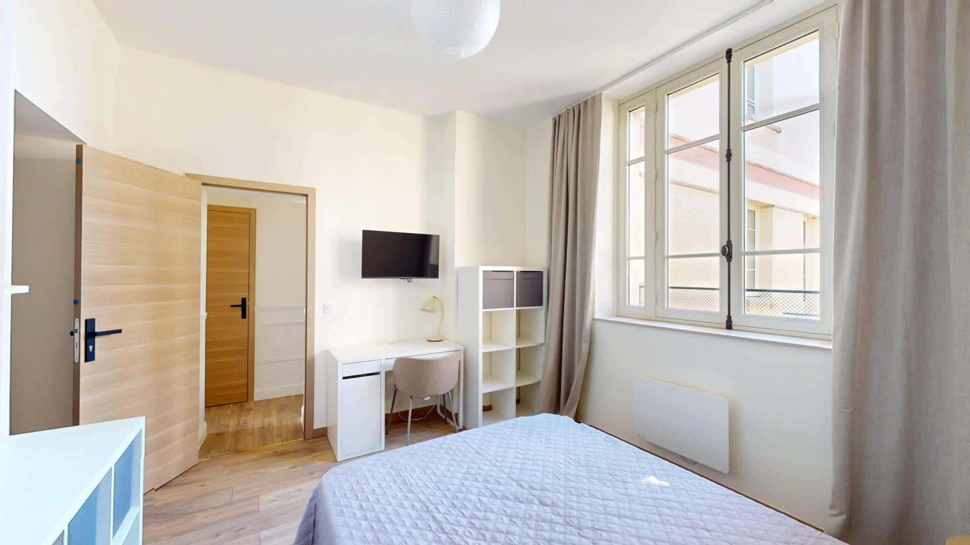 Student room in  with study area and shared facilities