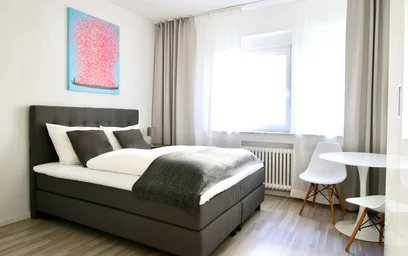 {area} de çift kişilik yataklı kiralık oda