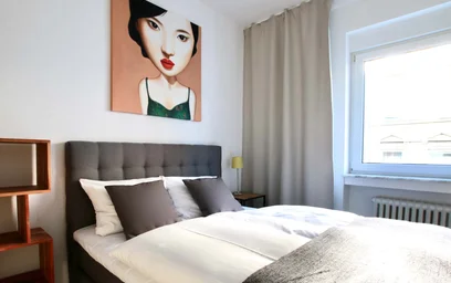 {area} de çift kişilik yataklı kiralık oda