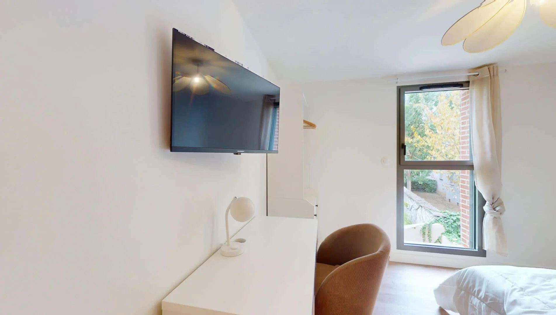 Student room in  with study area and shared facilities