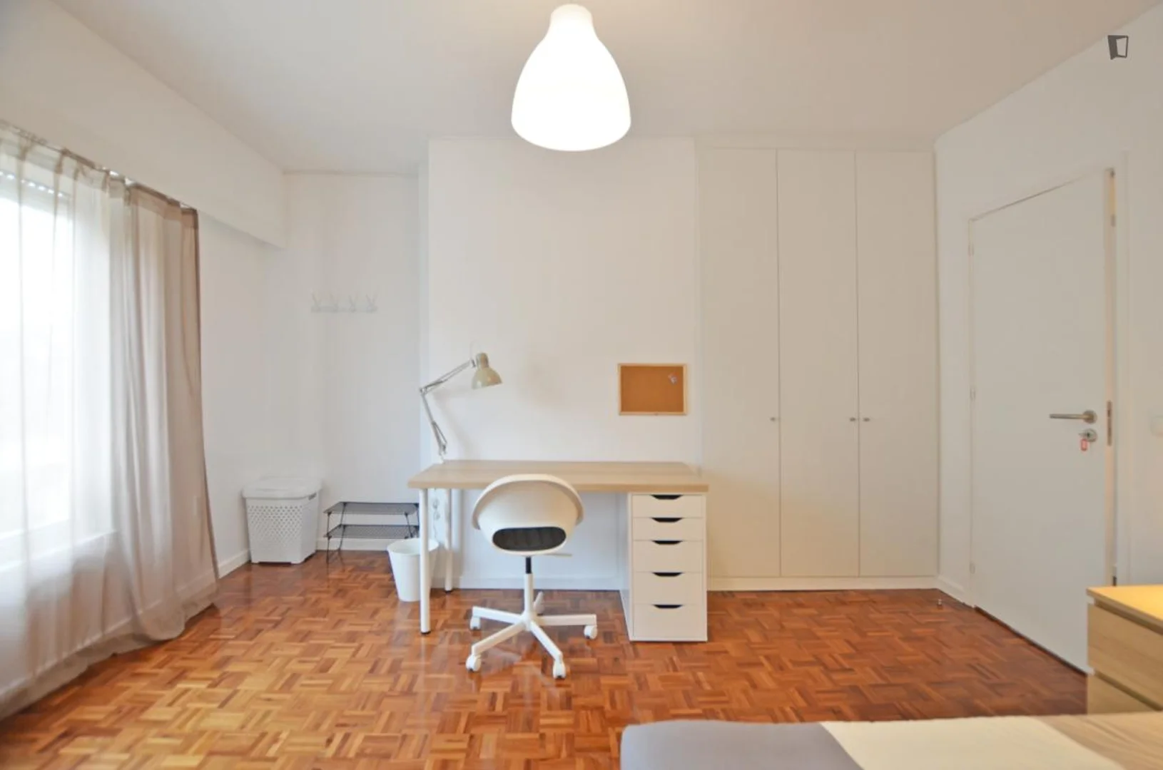 Affordable room for students with ample lighting in 