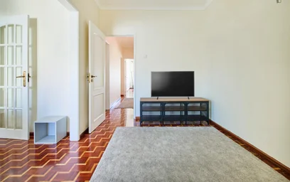 Chambre privée à Rua Luís de Freitas Branco, image 16 de 49