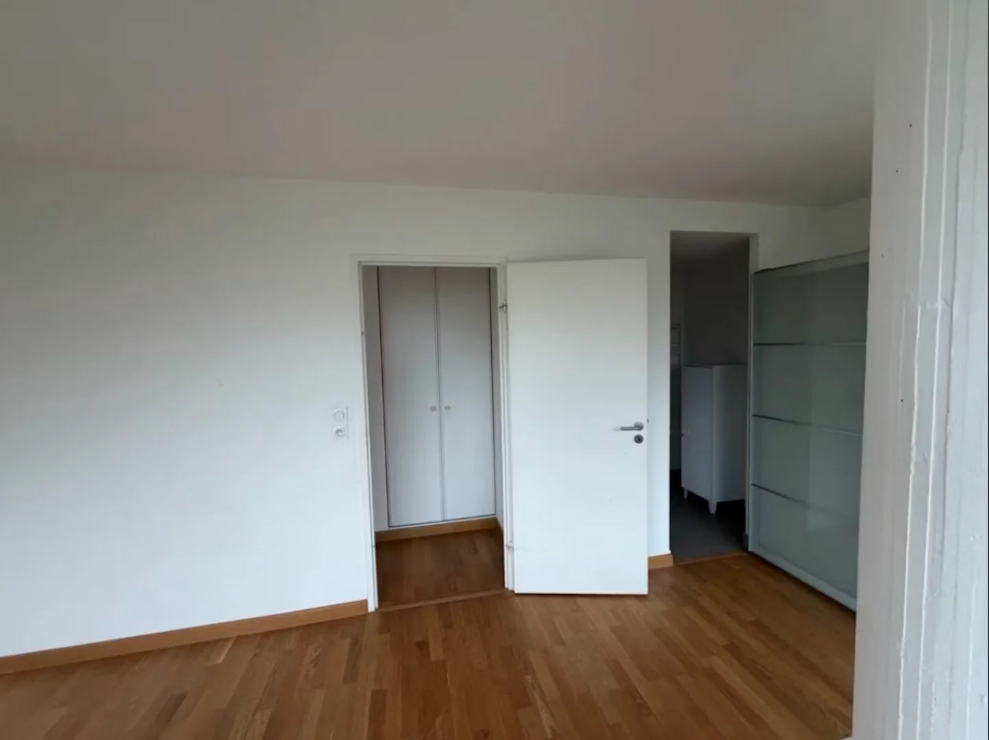 Student room in with study area and shared facilities