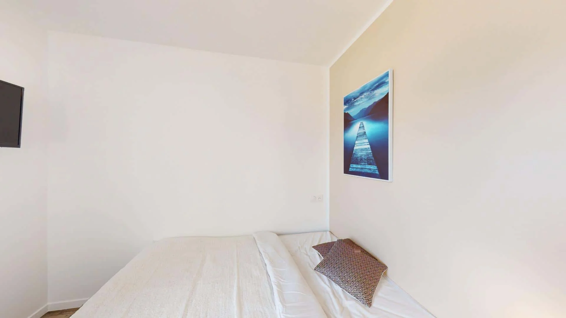 Student room in with study area and shared facilities