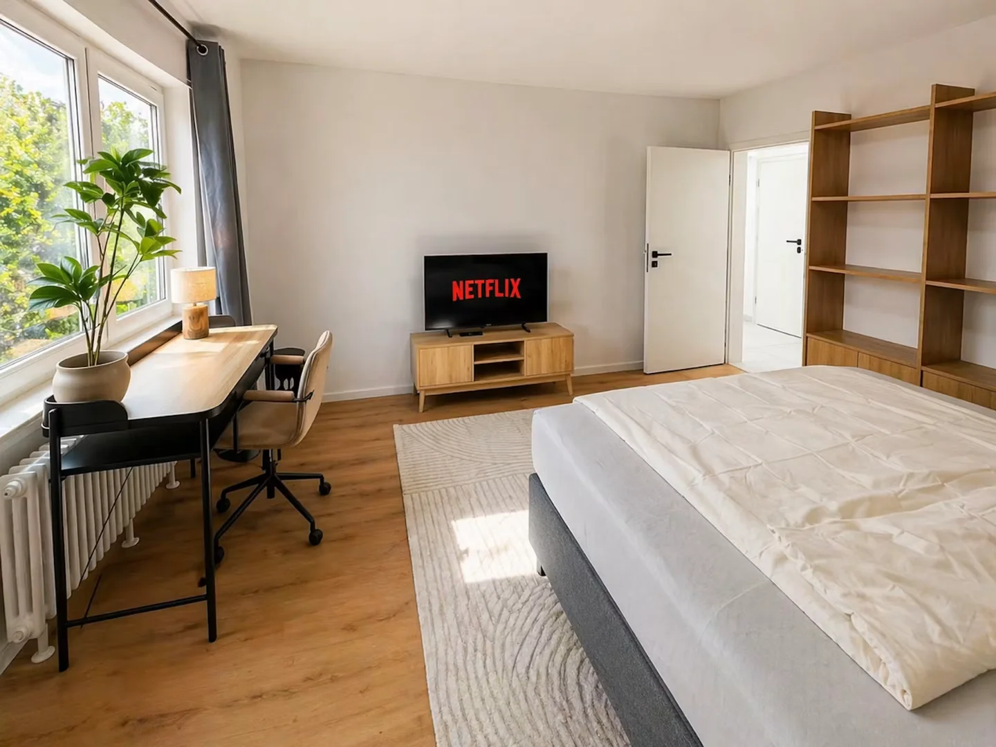 Quarto de estudante em  com área de estudo e instalações partilhadas