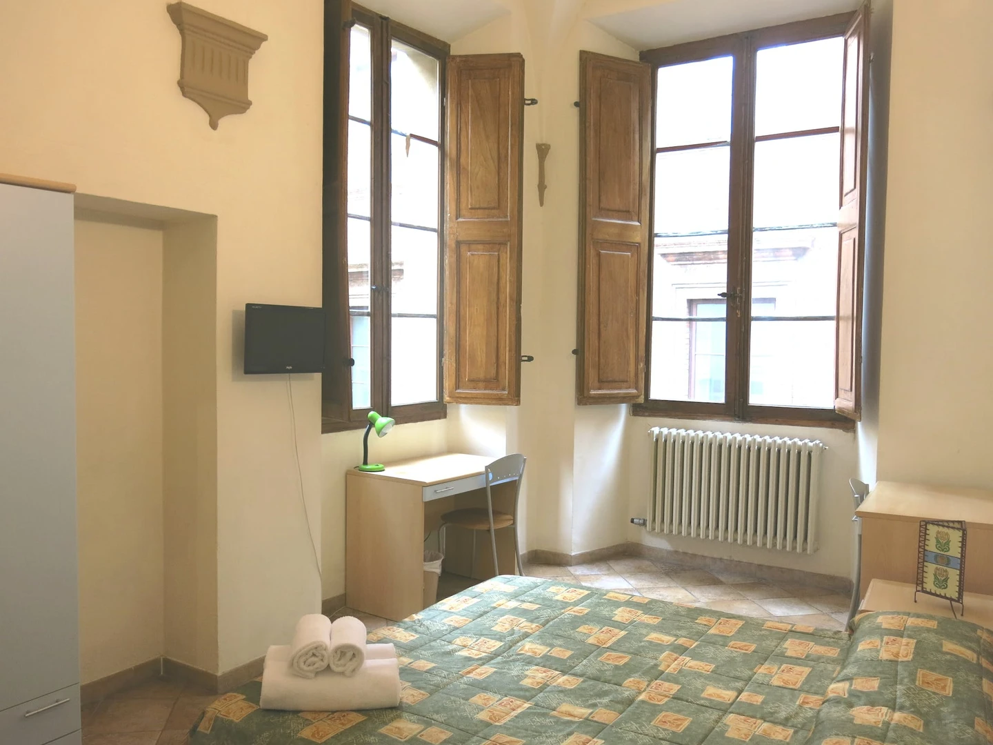 Bright shared room for rent in Siena