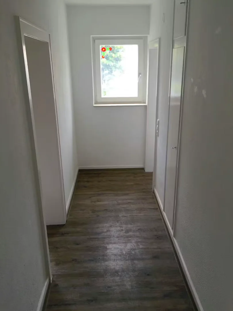 Quarto de estudante em  com área de estudo e instalações partilhadas