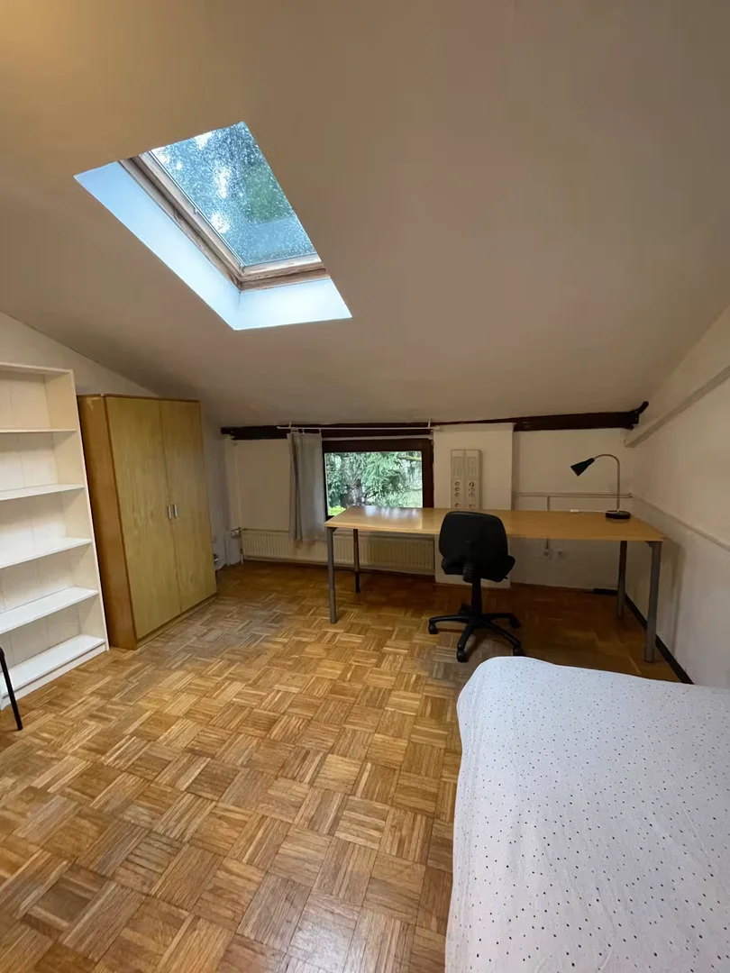 Student room in  with study area and shared facilities