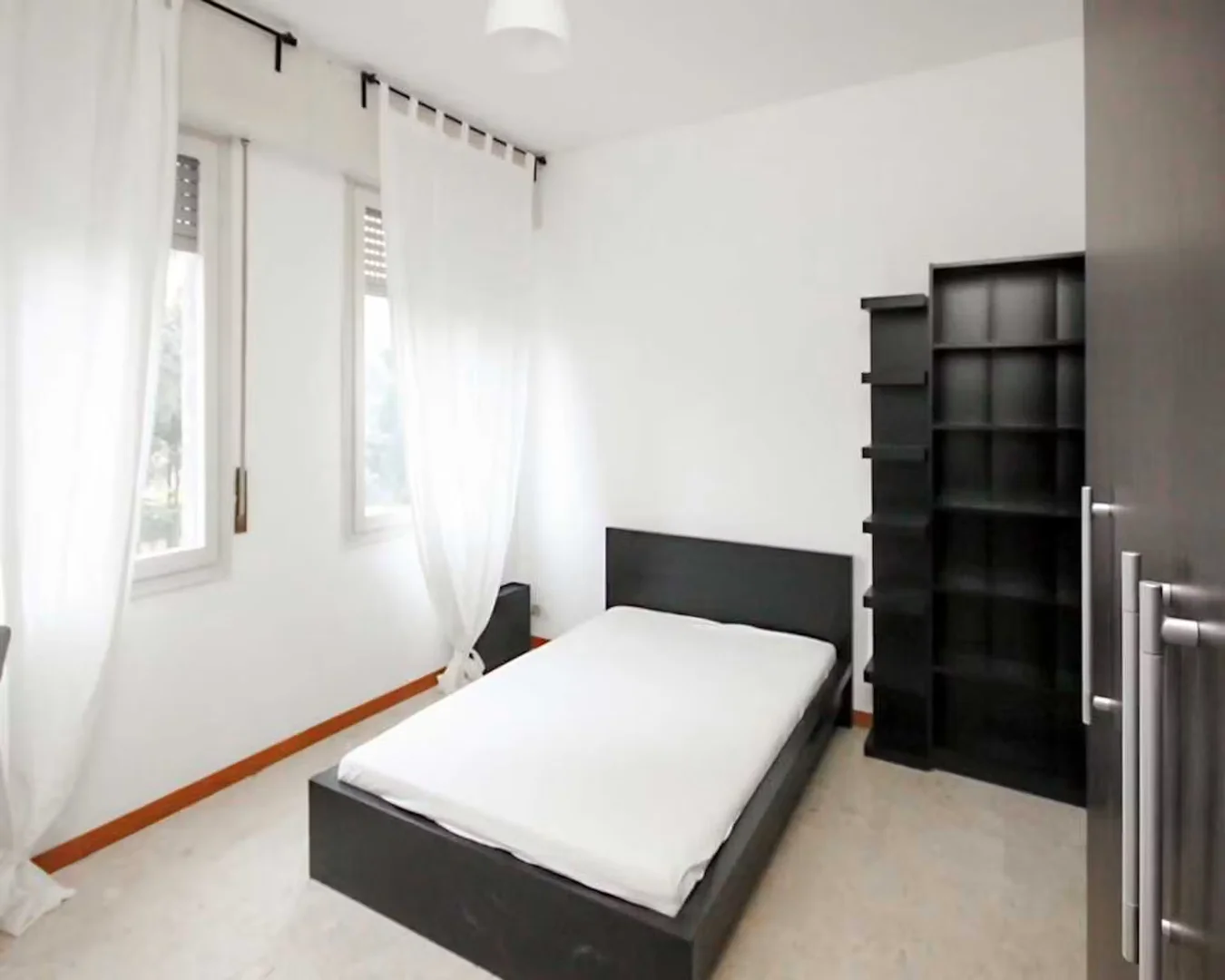 Affordable room for students with ample lighting in 