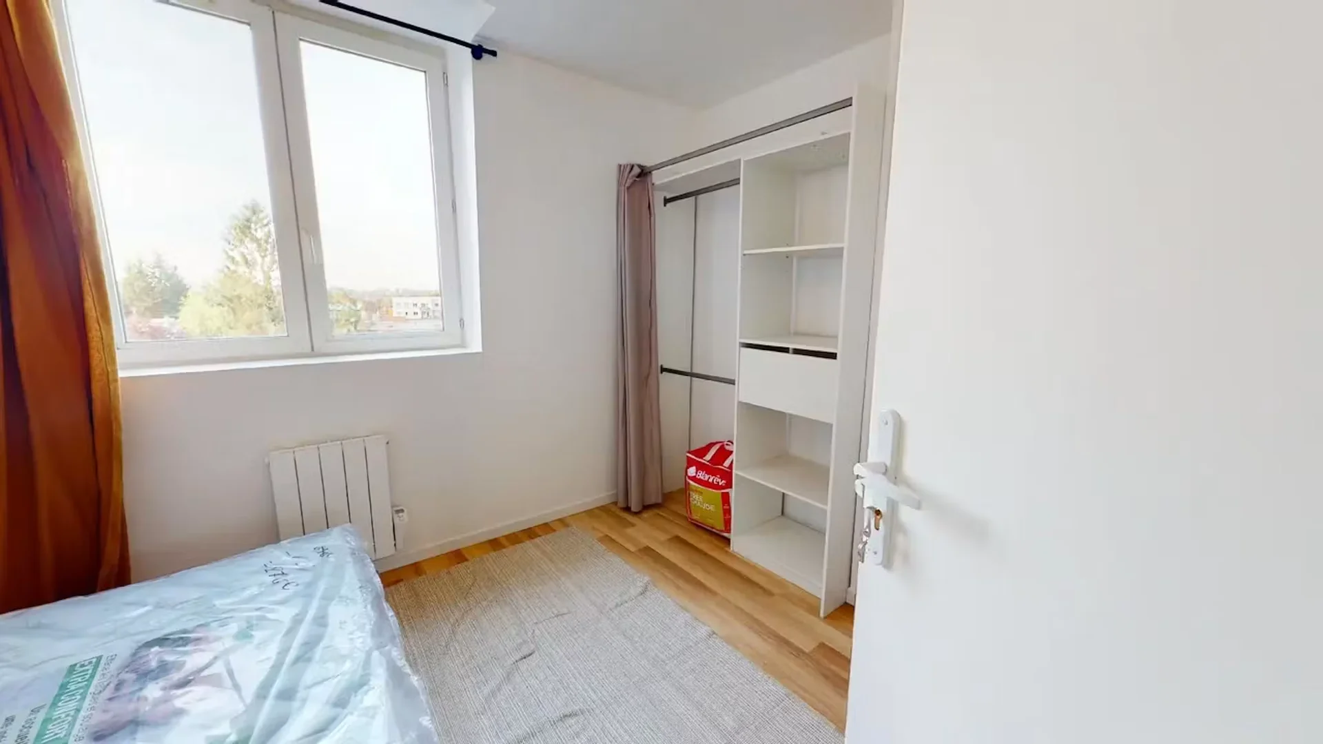 Student room in  with study area and shared facilities