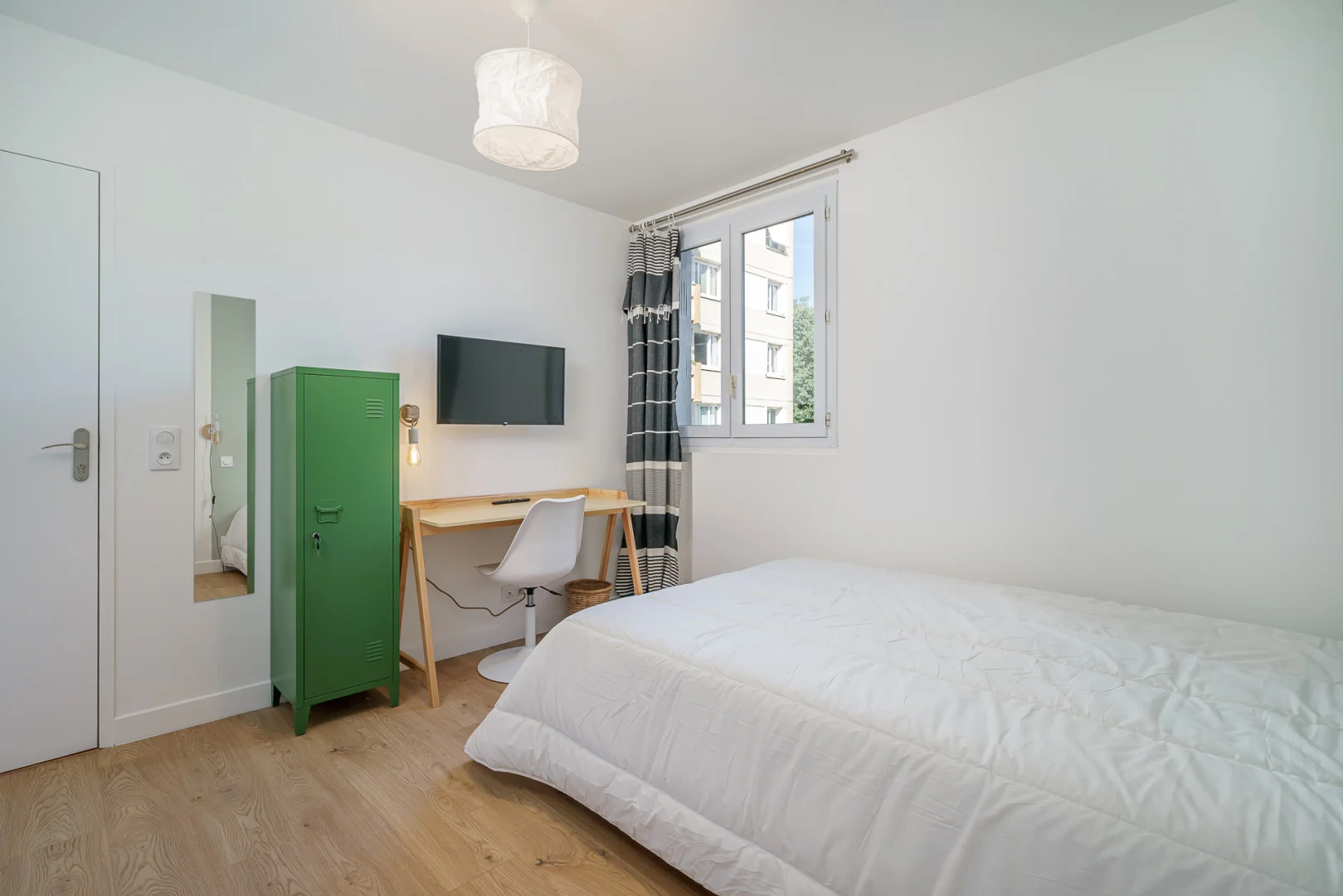 Affordable room for students with ample lighting in