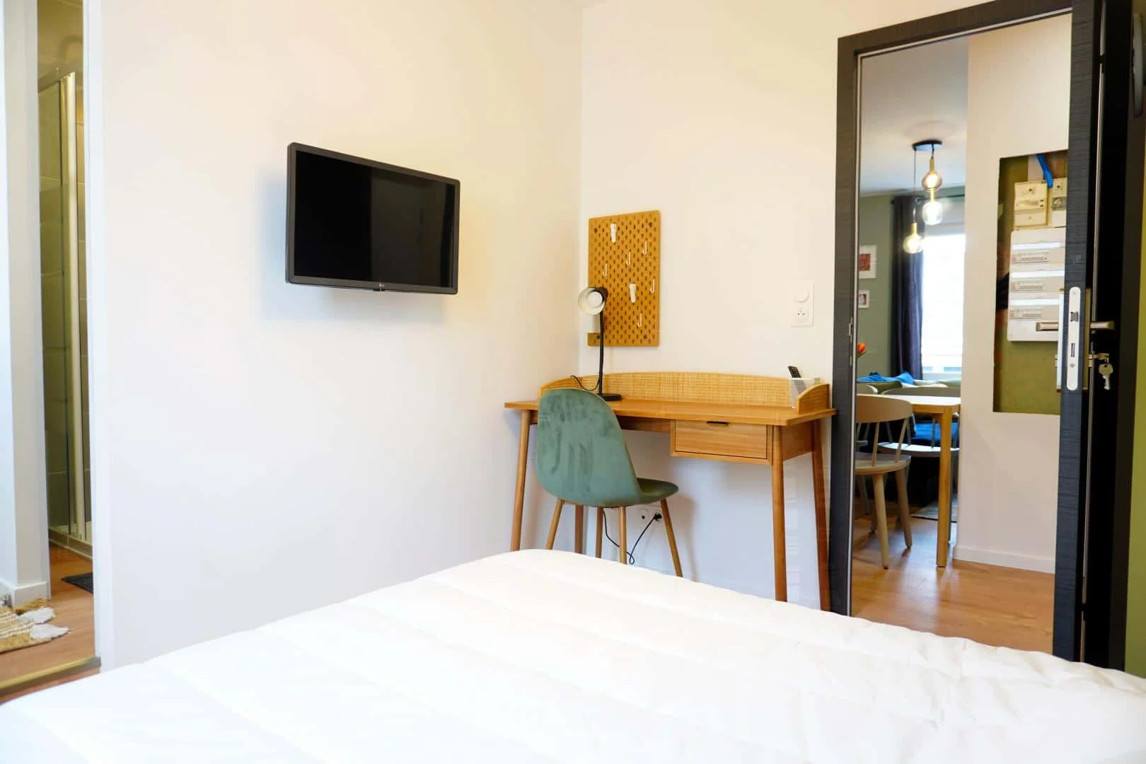 Student room in with study area and shared facilities