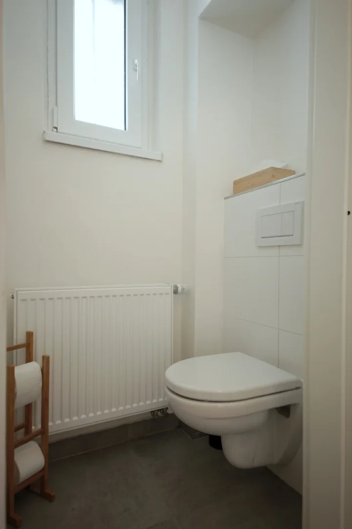 Quarto de estudante em  com área de estudo e instalações partilhadas