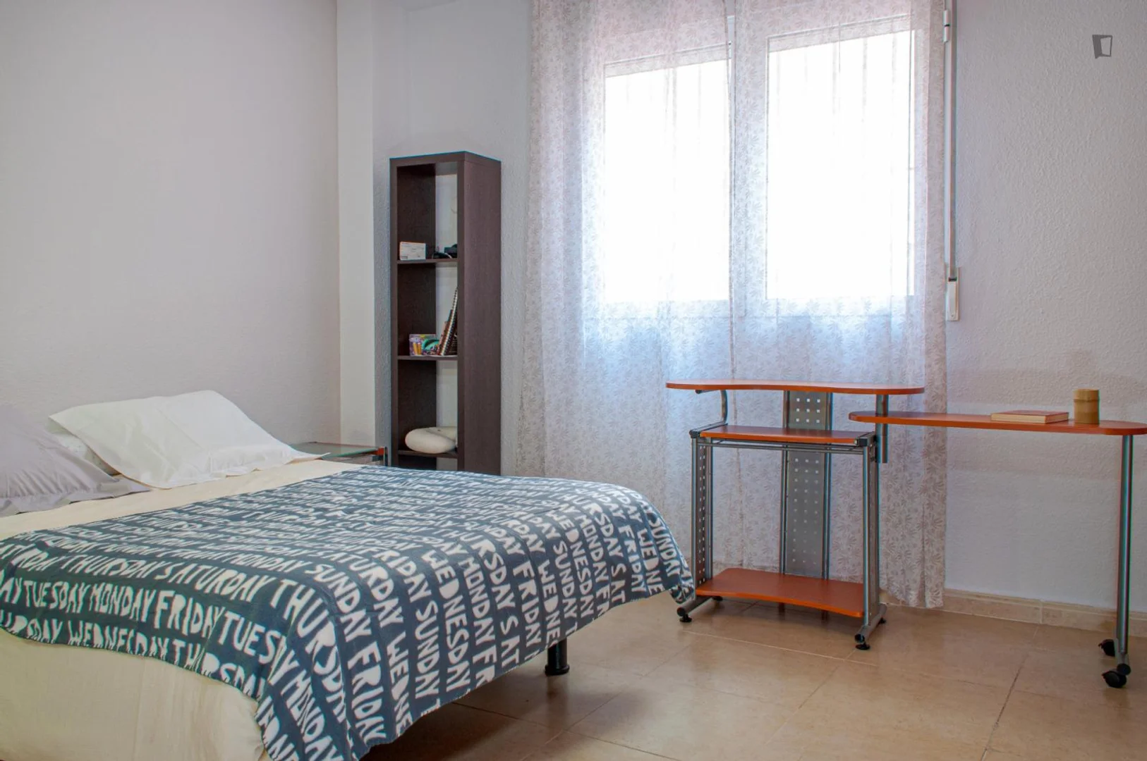 Affordable room for students with ample lighting in 
