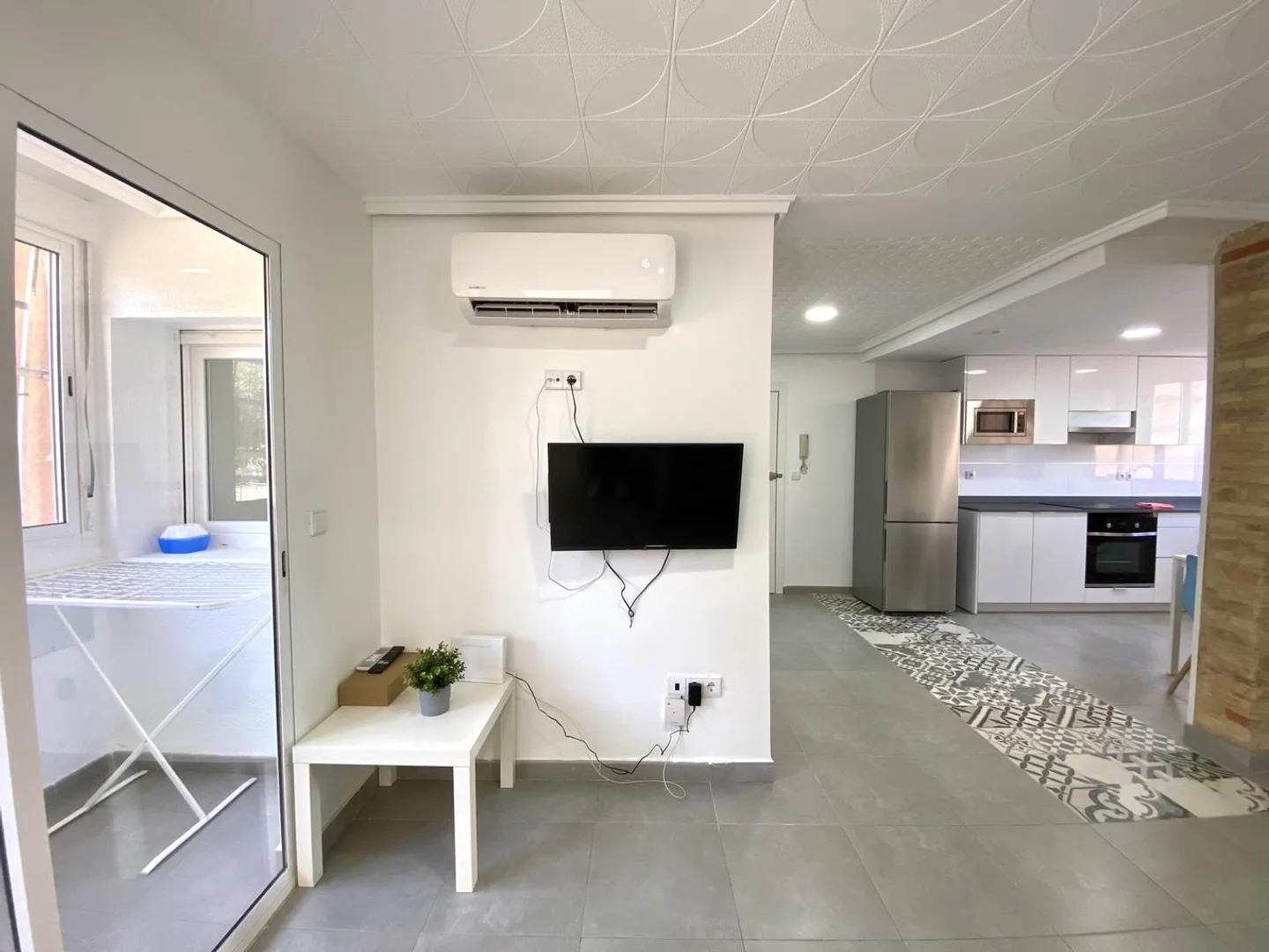 Quarto de estudante em  com área de estudo e instalações partilhadas