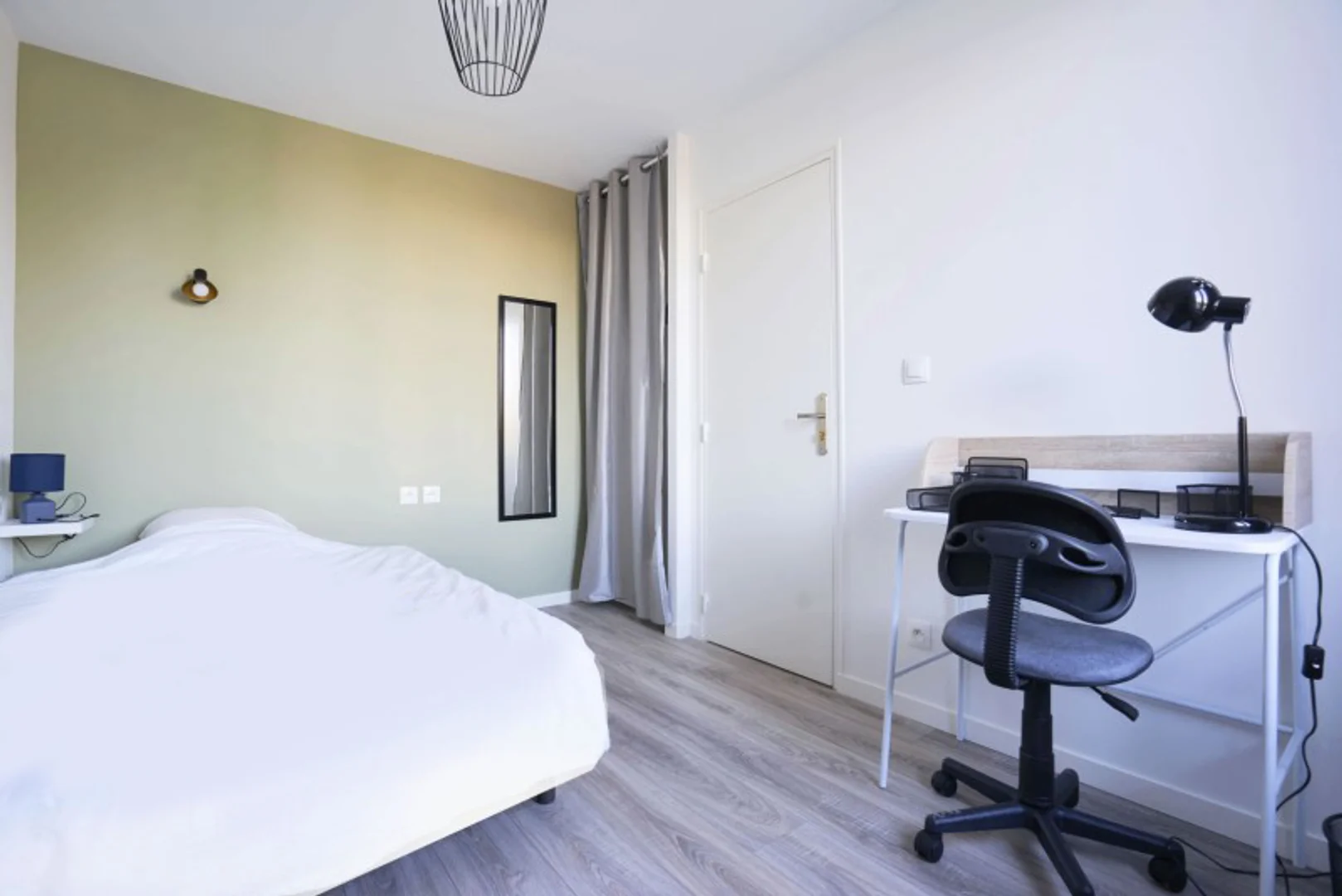Student room in  with study area and shared facilities