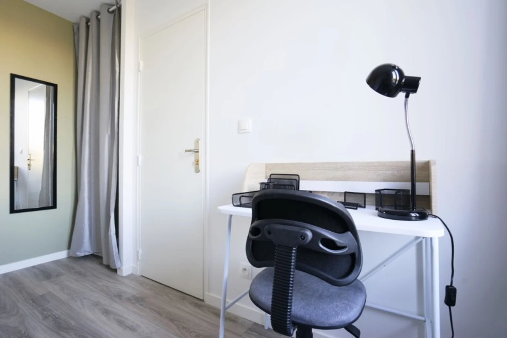 Student room in  with study area and shared facilities