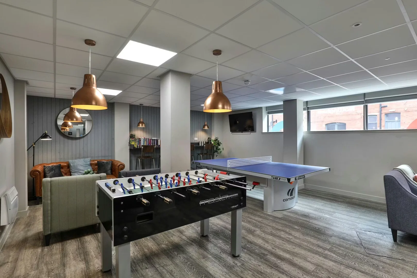 Chambre d'étudiant à  avec espace d'étude et installations communes