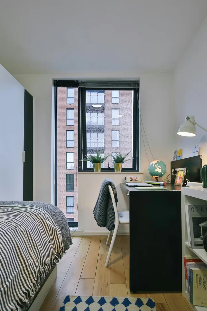 Student room in  with study area and shared facilities
