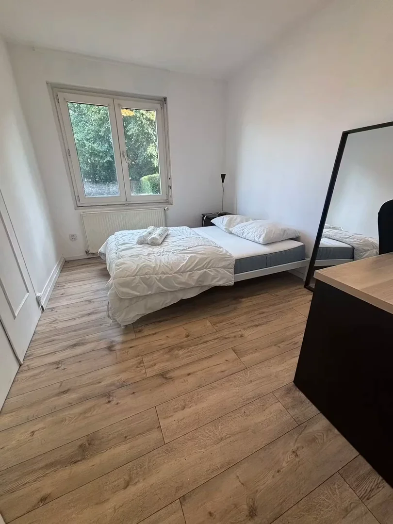 Student room in  with study area and shared facilities