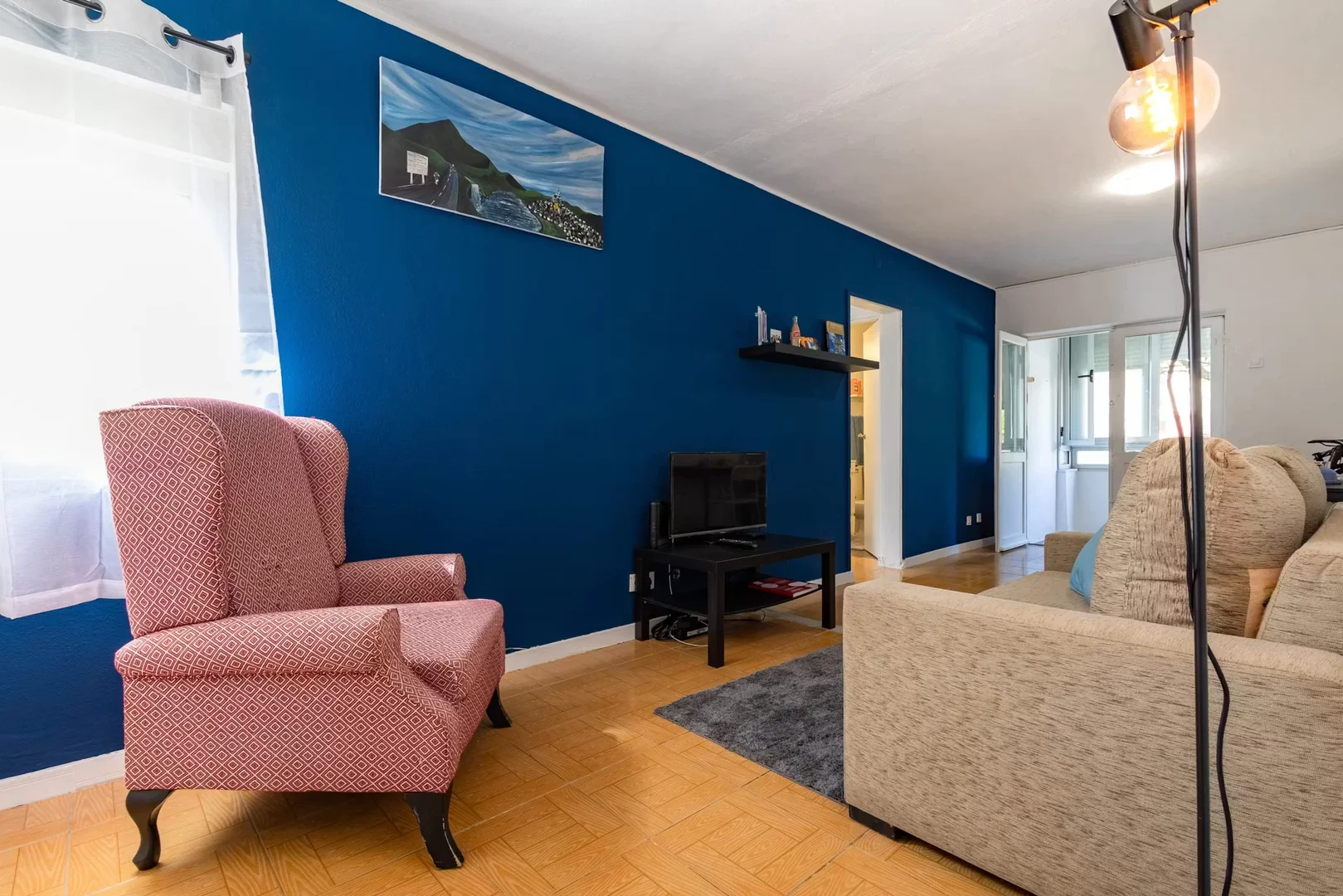 Student room in with study area and shared facilities