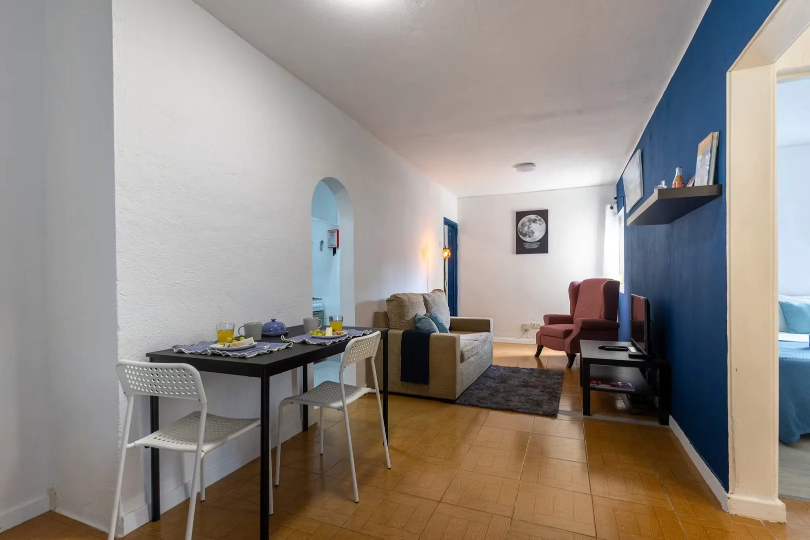 Student room in with study area and shared facilities