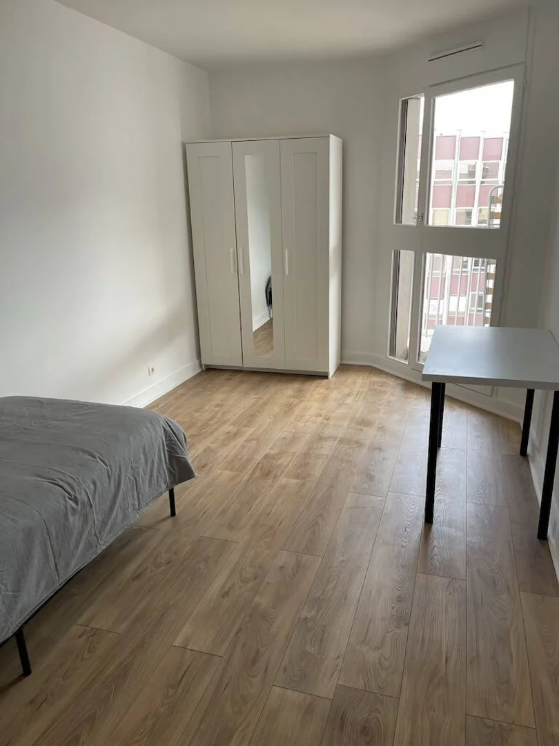 Student room in  with study area and shared facilities