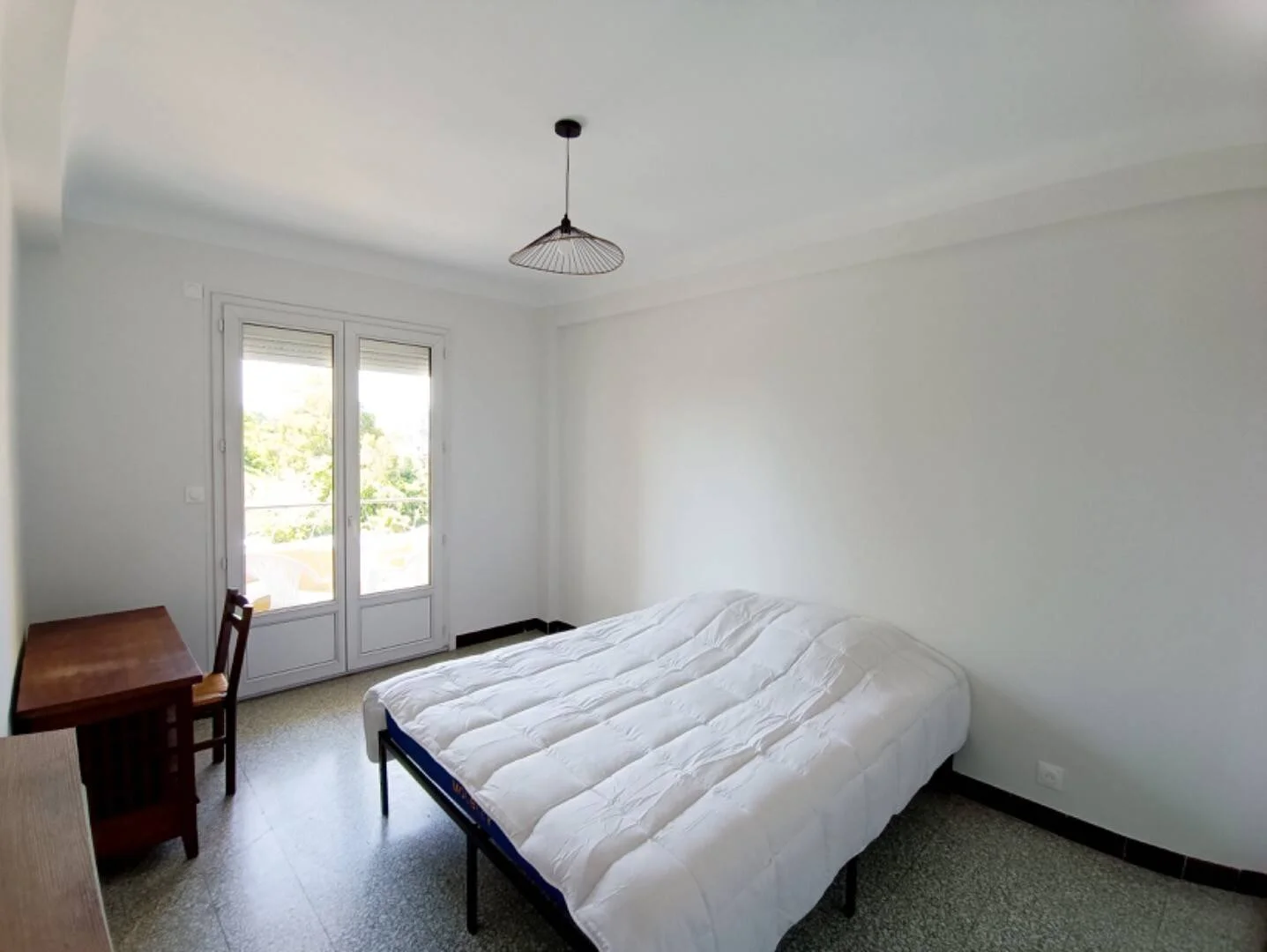 Student room in  with study area and shared facilities
