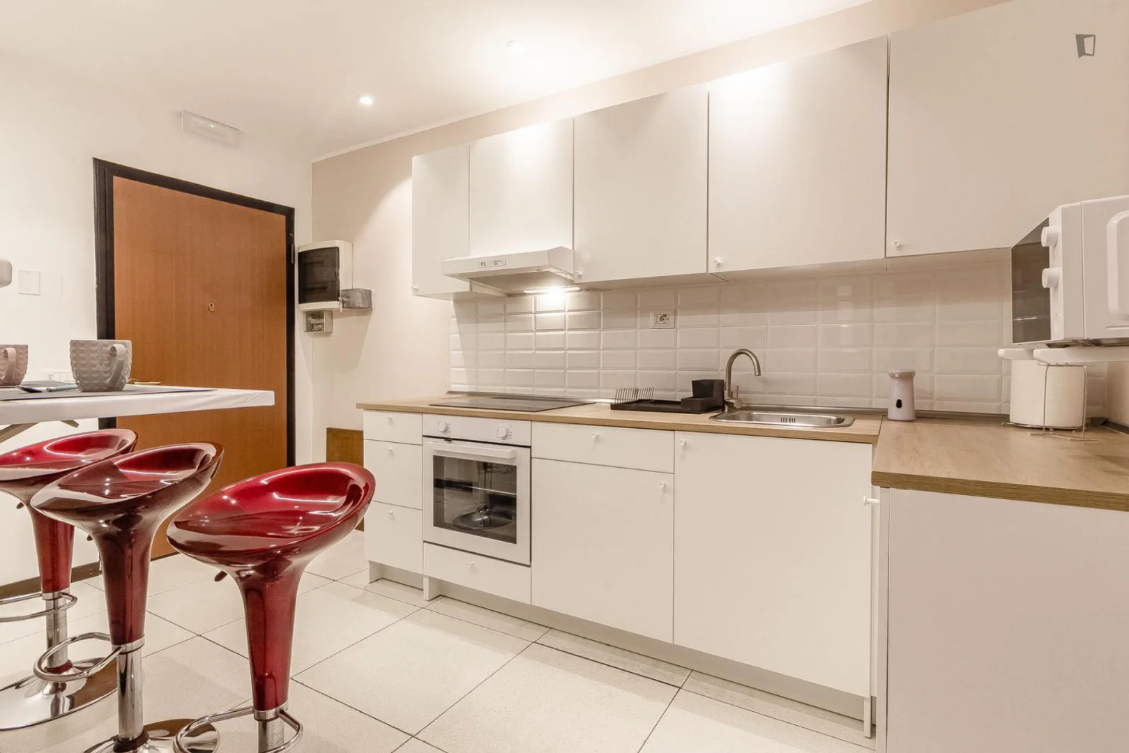 Quarto de estudante em  com área de estudo e instalações partilhadas